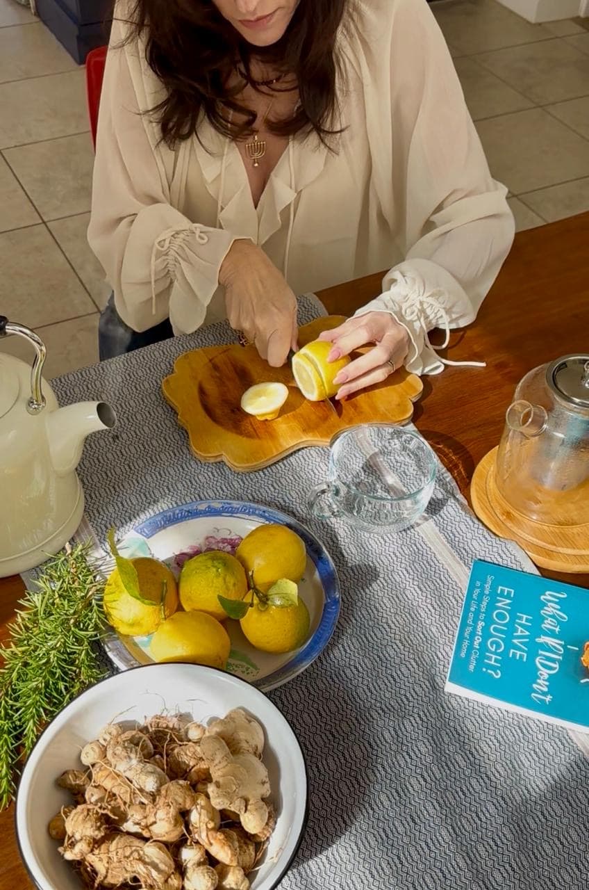 Woman cutting lemons at the table